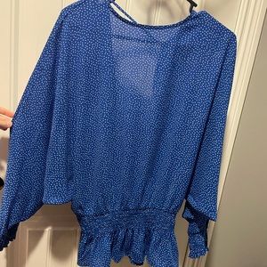 Polka dot blue and white long sleeve top